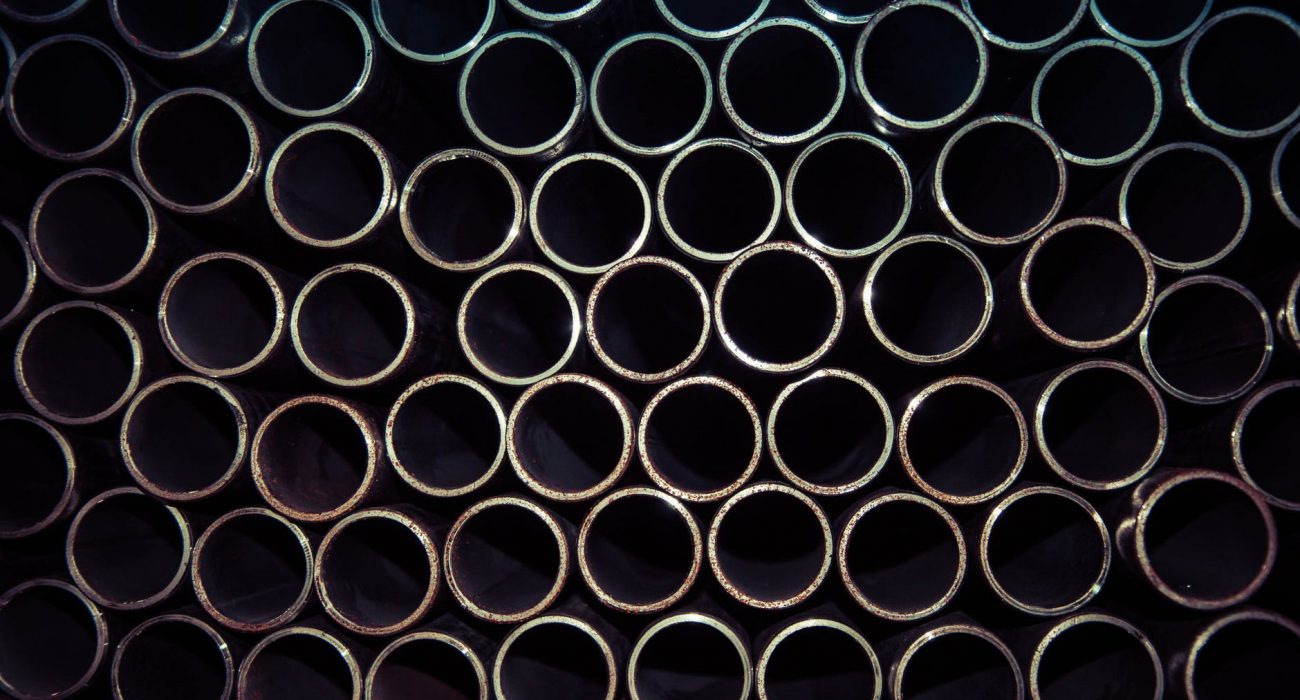 close up photo of gray metal pipes