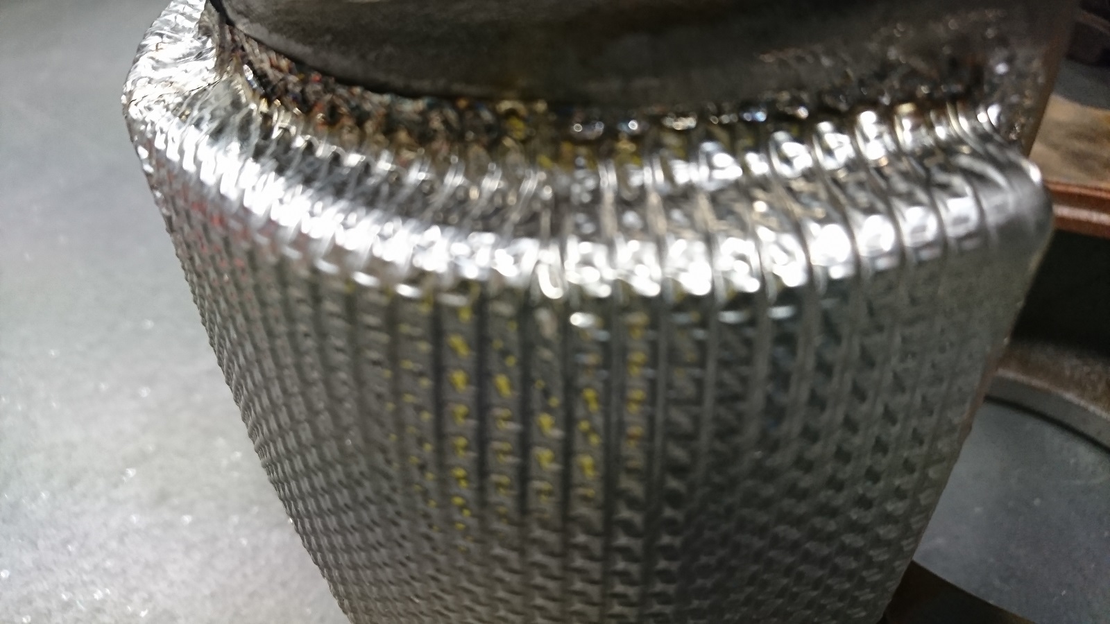 Single sided spot welding of exhausts