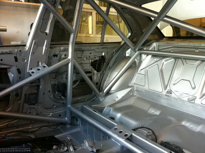 stainless steel roll cage inside a car